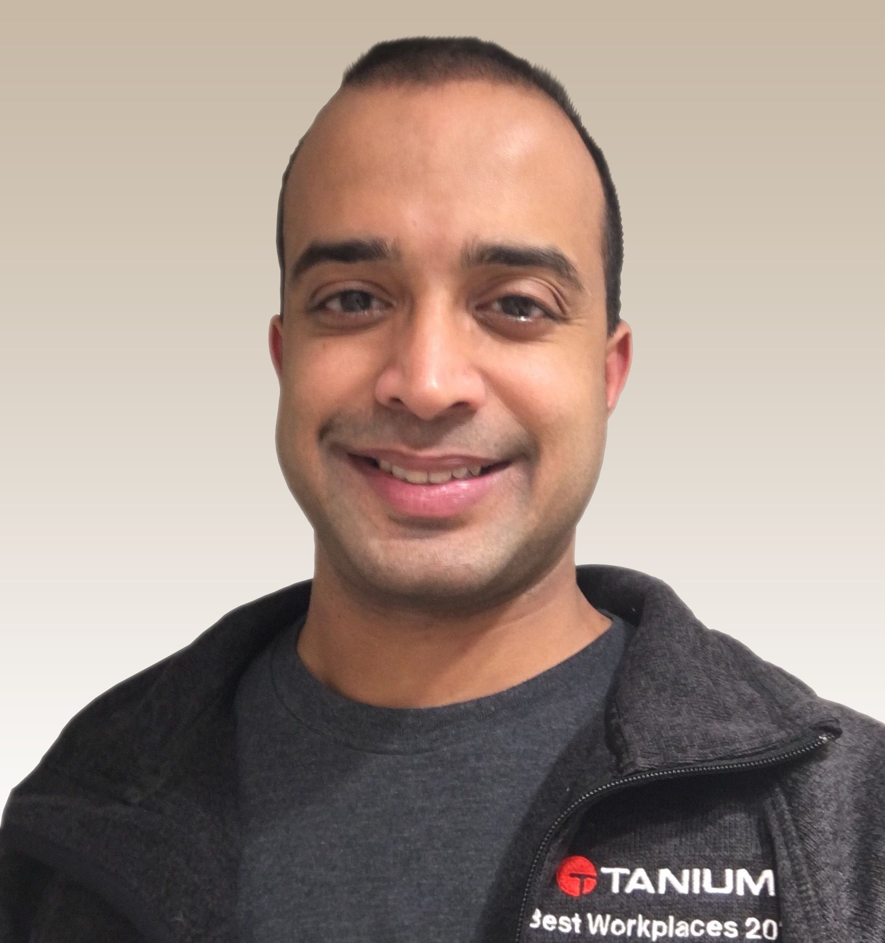 Headshot of Naveen Goela with Best Workplaces badge