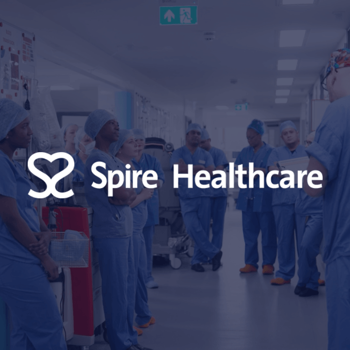Spire Healthcare featured image. Medical professionals in a hallway with logo overlay