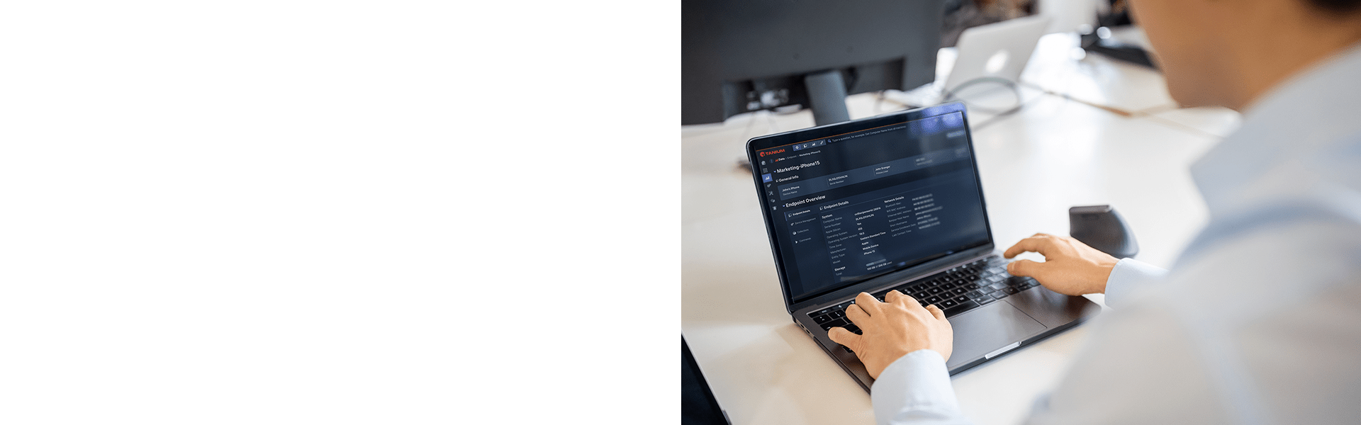 Personne utilisant le tableau de bord Tanium sur un ordinateur portable pour la gestion des endpoints